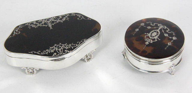 A silver and tortoiseshell