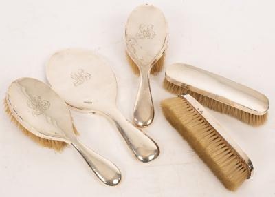 A silver backed dressing table set,