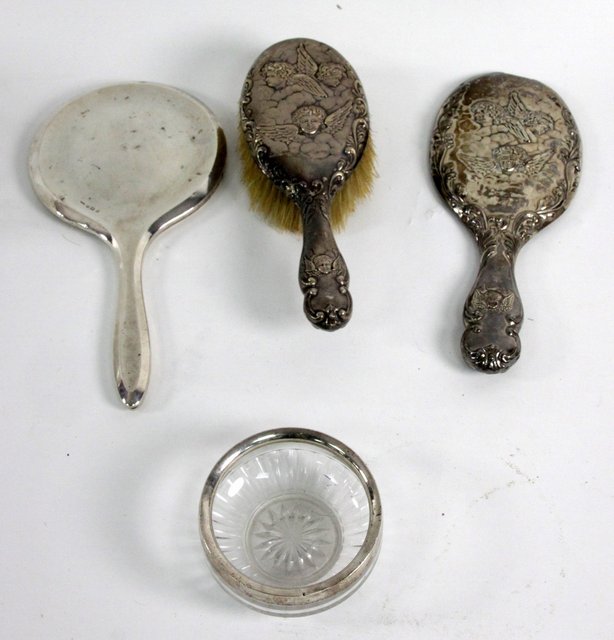 A silver backed hairbrush Chester
