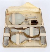 A silver backed travel dressin