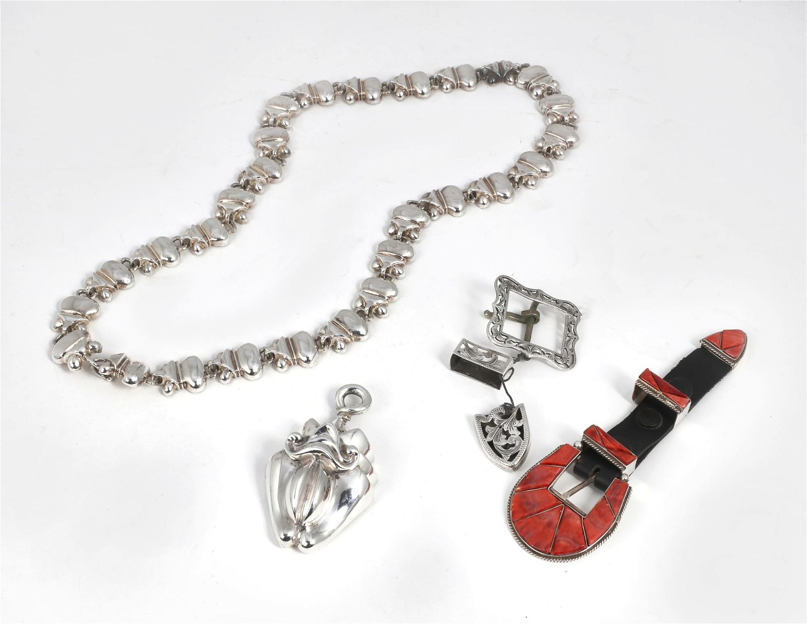 A SILVER BELT AND TWO SILVER BELT