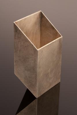 A silver box of geometric cut