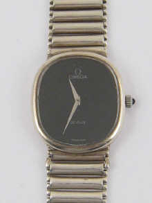 A silver bracelet/wrist watch by