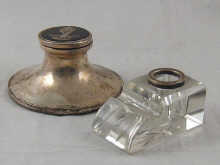 A silver capstan ink well the