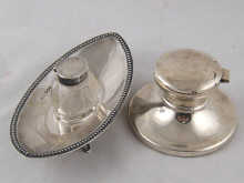 A silver capstan inkwell 9cm.