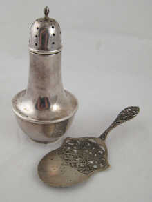 A silver cased bakelite sugar