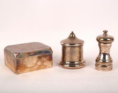 A silver cigarette box, marks