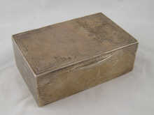 A silver cigarette box with
