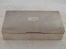 A silver cigarette box with