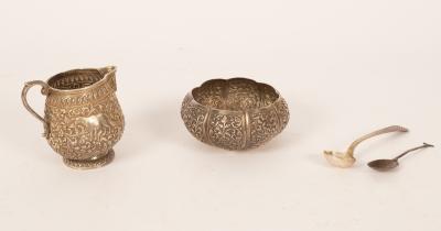 A silver coloured metal bowl,