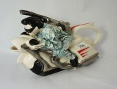 A Silver Crane Teapot of Elvis