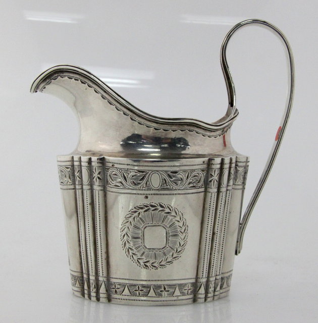 A silver cream jug cancelled