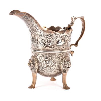 A silver cream jug, in the Irish