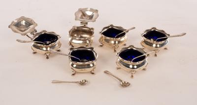 A silver cruet set, Adie Bros.,