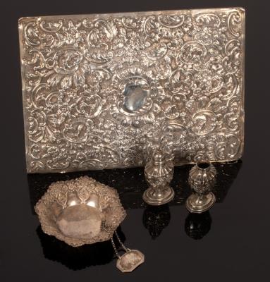 A silver decanter label 'Port', a