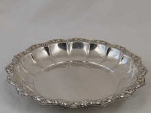 A silver dish 31 cm across German