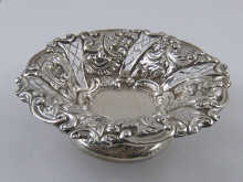 A silver embossed and pierced