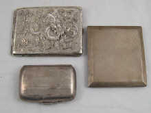 A silver engine turned slide