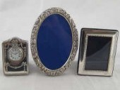 A silver faced boudoir clock 6