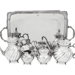 A Silver Four-Piece Tea and