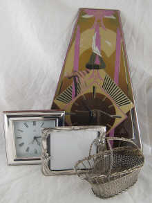 A silver framed mantel clock 19 x
