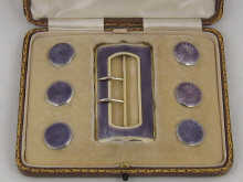 A silver gilt and enamel belt