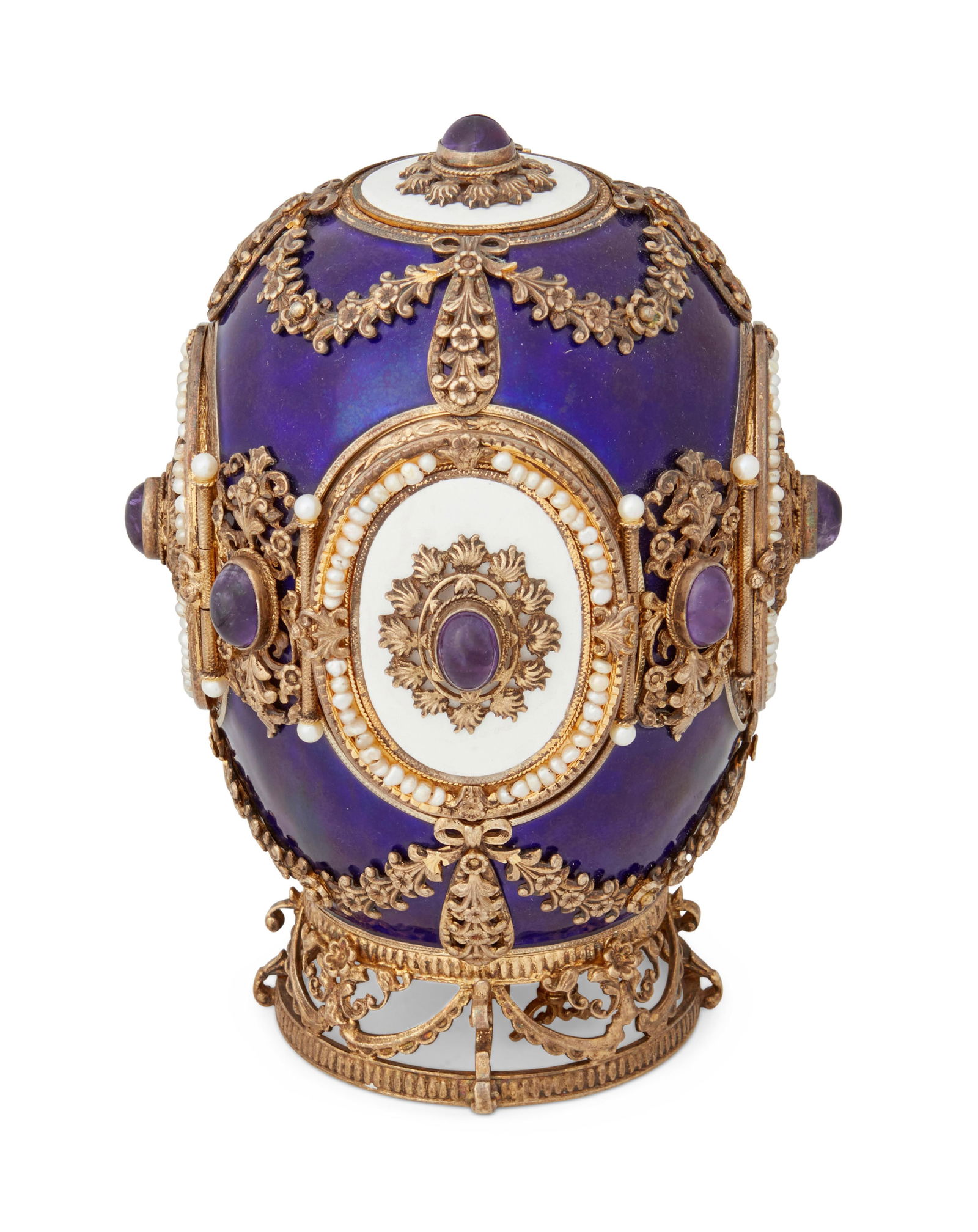 A SILVER-GILT AND ENAMEL EGG
