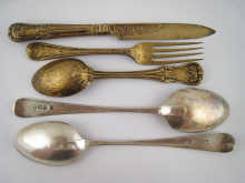 A silver gilt knife fork and