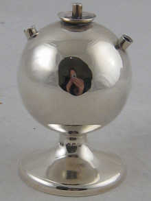 A silver globe table cigar