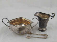 A silver helmet cream jug
