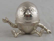 A silver Humpty Dumpty egg cup