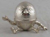 A silver Humpty Dumpty egg cup