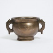A Silver-Inlaid Bronze Gui-For