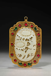 A SILVER INLAID WITH GEMSTONES