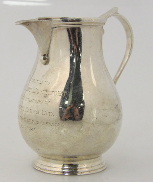A silver jug Goldsmiths &
