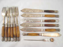 A silver letter opener with paste