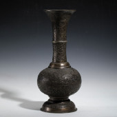 A SILVER LONG NECKED VASE WITH