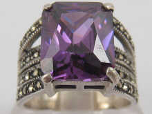 A silver marcasite and paste ring.