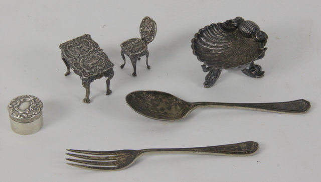 A silver miniature table and