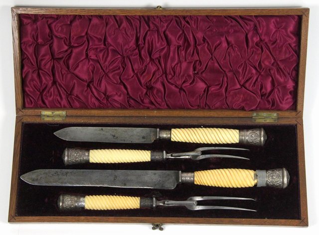 A silver mounted carving set