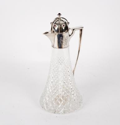 A silver mounted claret jug,