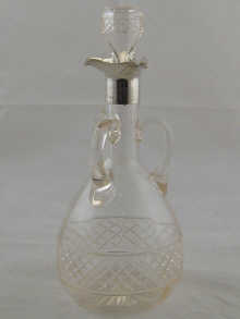 A silver mounted glass liqueur