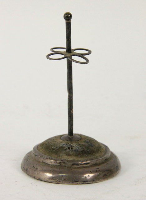 A silver mounted hat pin stand