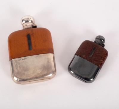 A silver mounted hip flask, James