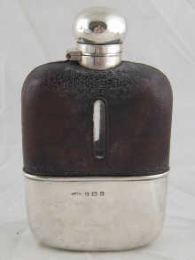 A silver mounted leather cased