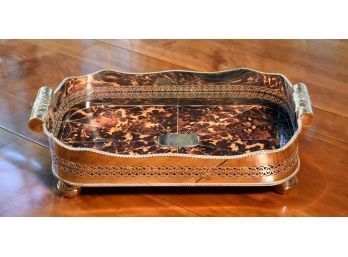 A silver on copper serving tray