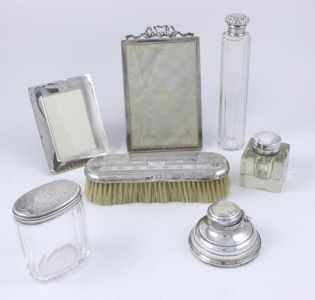 A silver photograph frame E&S