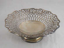 A silver pierced dish on pedestal