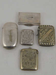 A silver pill box and a silver