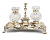 A SILVER PLATED AND CUT CRYSTA